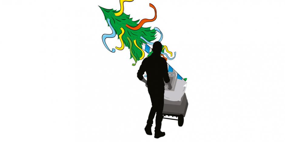 Silhouette of a man delivering a Christmas tree