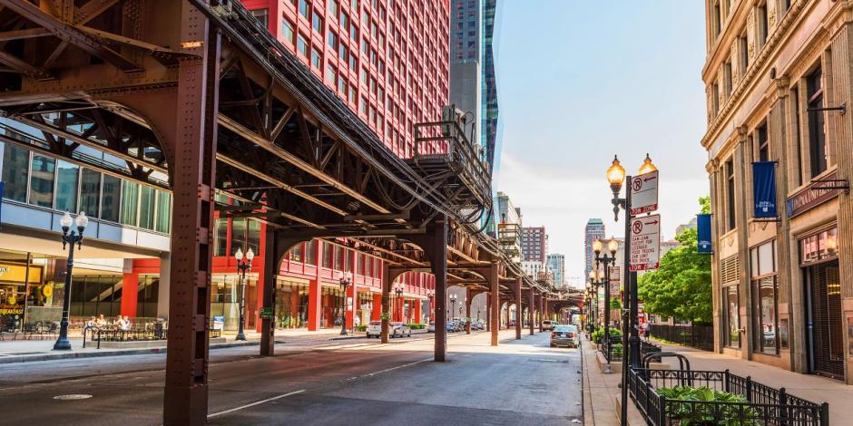 Chicago, USA - May 30, 2016: Downtown street with CTA train metro rail line​
