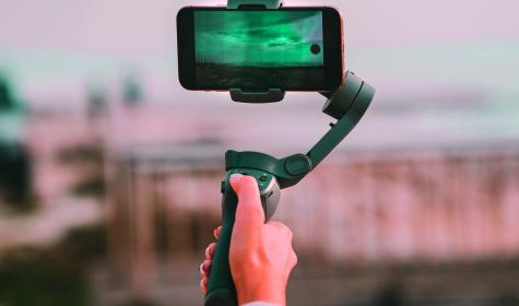 someone making a film with a smartphone