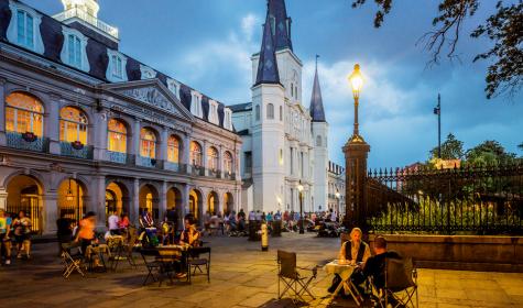 The Cabildo on the left, St Louis Cathedral on the background. French Quarter, fortune tellers in Jackson Square