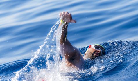 Neil Agius swimming in the ocean