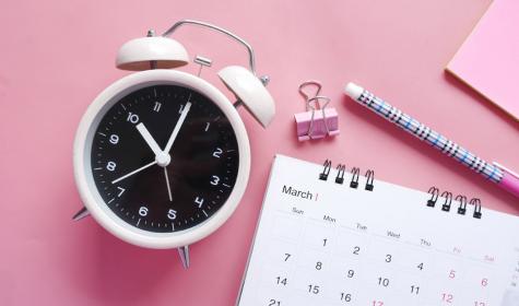 clock, calendar, pen and clip