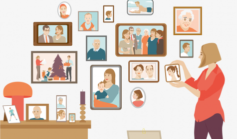 Frau mit Familienbildern an der Wand